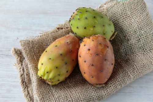 Prickly pears laying on a table