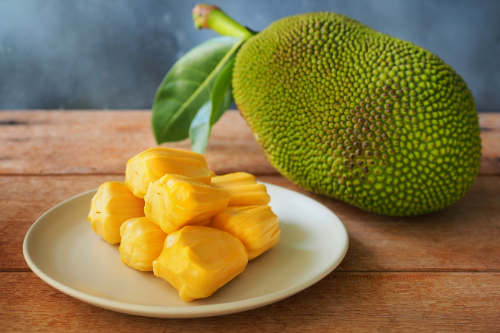 Jackfruit with pulp displaying on a table