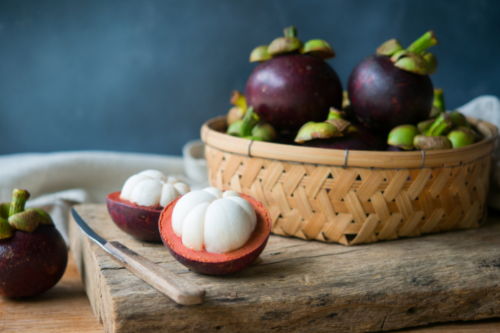 Mangosteen in a bowl placed on a table