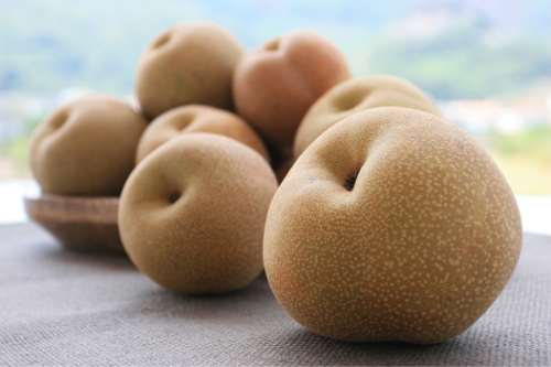 Asian pears on a table