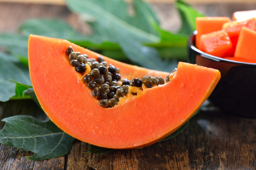 Piece of papaya formosa laying on the table