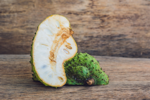 Soursop / Guanabana displaying on a wooden table